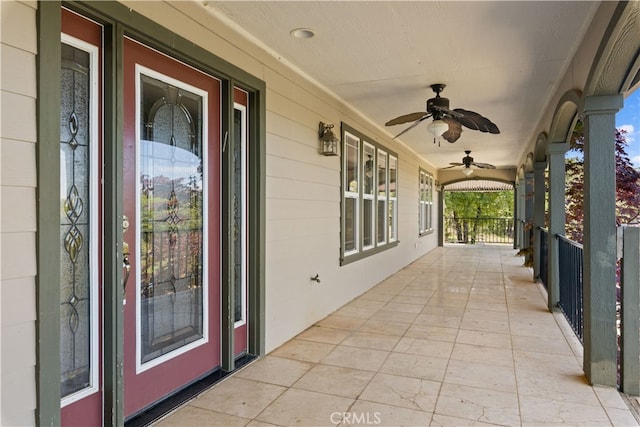 view of patio / terrace featuring ceiling fan