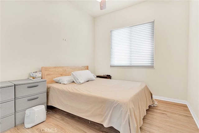 bedroom featuring ceiling fan and hardwood / wood-style floors