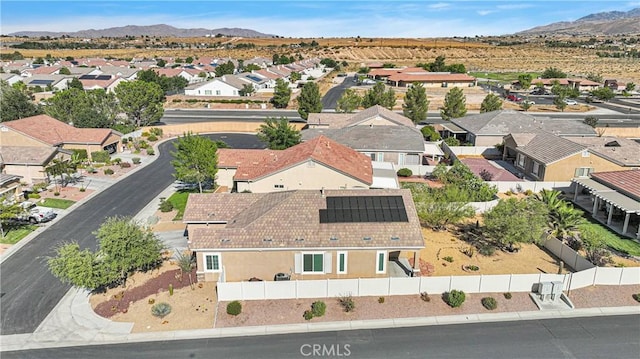 birds eye view of property featuring a mountain view