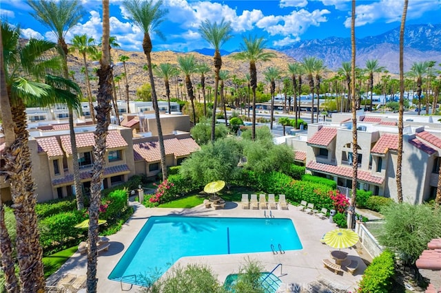 view of pool with a mountain view