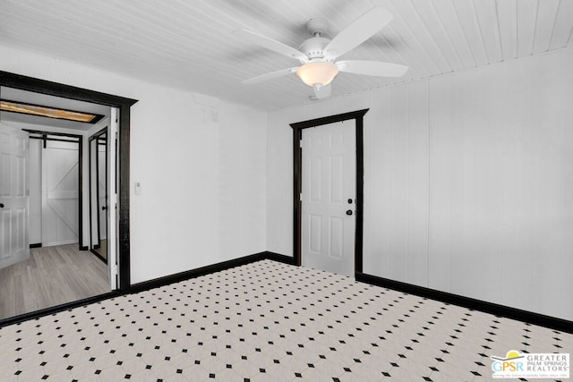 spare room with ceiling fan