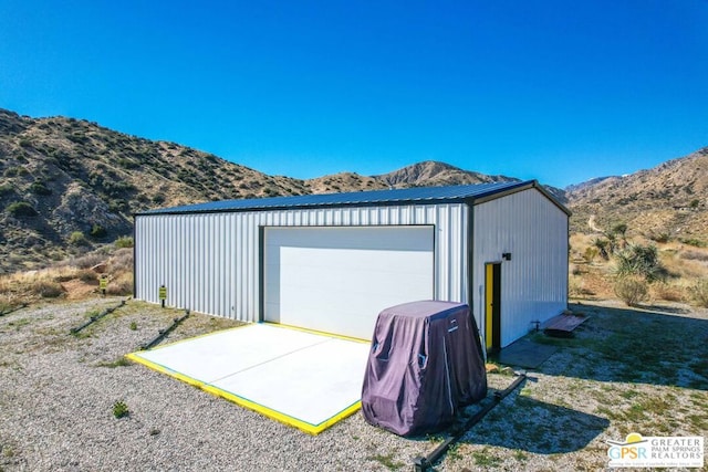 garage featuring a mountain view