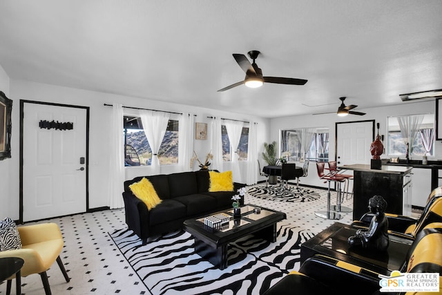 living room featuring ceiling fan