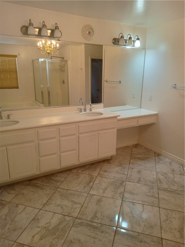 bathroom featuring walk in shower and vanity