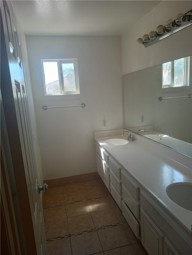 bathroom featuring vanity and tile patterned flooring