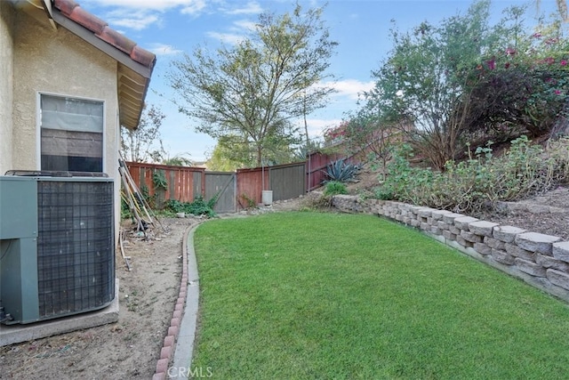 view of yard featuring central AC unit