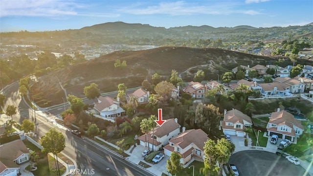 drone / aerial view featuring a mountain view