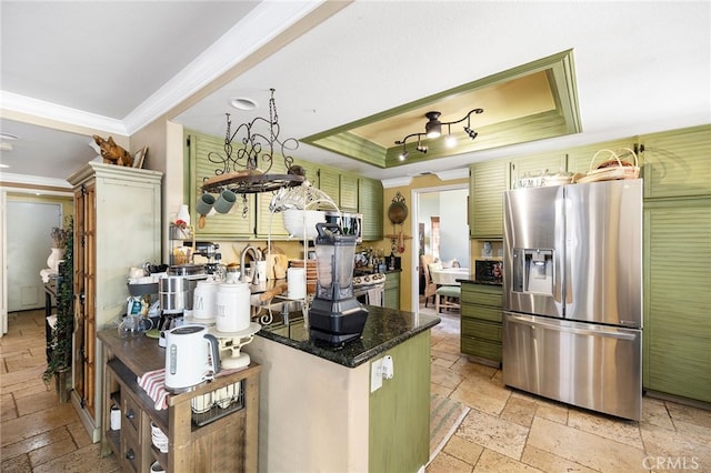 kitchen with a raised ceiling, stainless steel fridge with ice dispenser, and crown molding