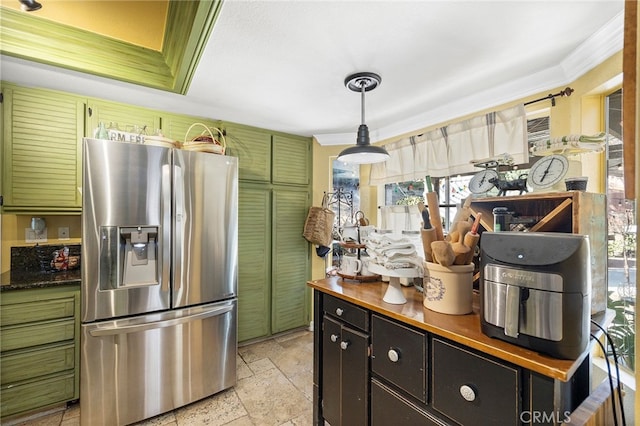 kitchen featuring stainless steel fridge with ice dispenser, crown molding, and hanging light fixtures