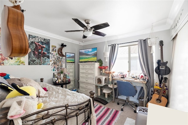 bedroom featuring a closet, ceiling fan, crown molding, and carpet floors