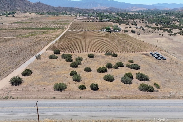 bird's eye view featuring a mountain view and a rural view