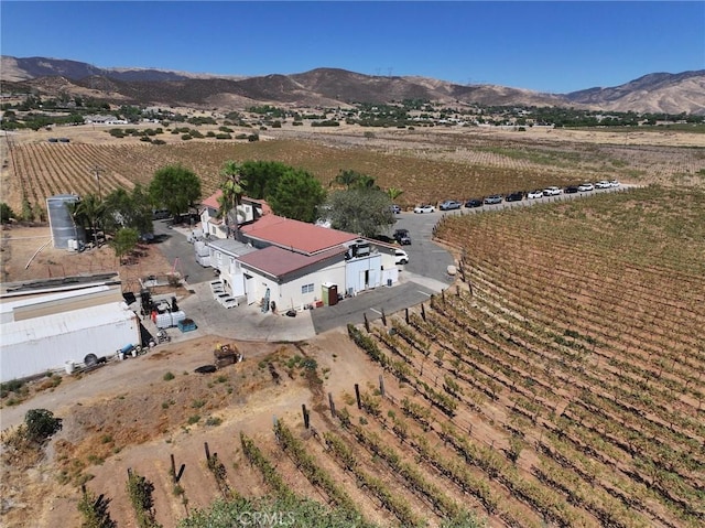 drone / aerial view with a rural view and a mountain view