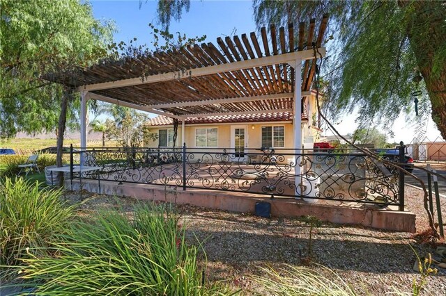 exterior space with a pergola