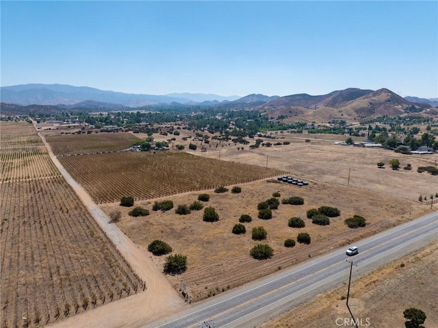 drone / aerial view with a rural view and a mountain view