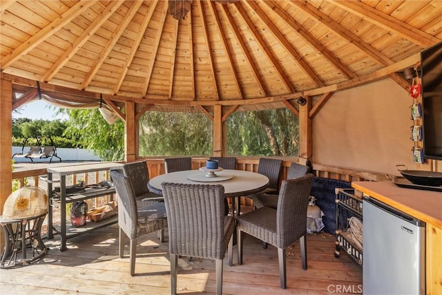 view of patio / terrace with a wooden deck and a gazebo