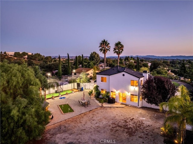 view of aerial view at dusk