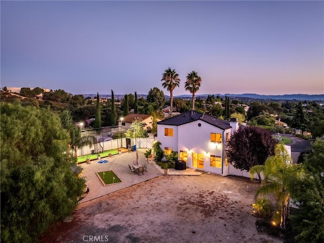 view of aerial view at dusk