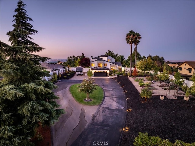 view of front of property with a garage