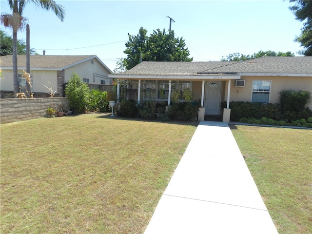 ranch-style house with a front yard