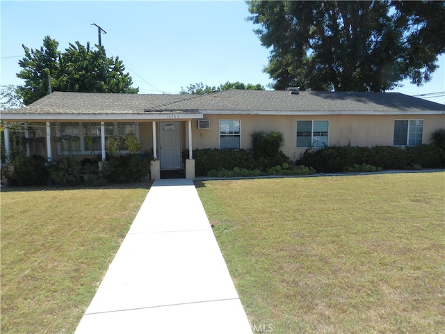 ranch-style house with a front yard