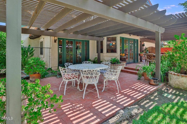 view of patio / terrace with a pergola and french doors