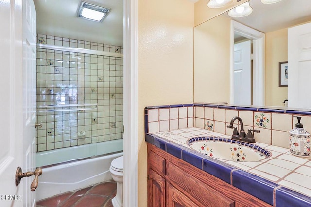 full bathroom featuring vanity, toilet, enclosed tub / shower combo, and backsplash