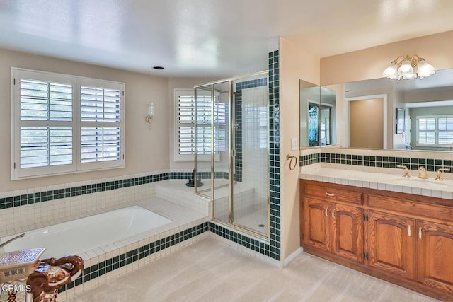 bathroom featuring vanity and plus walk in shower