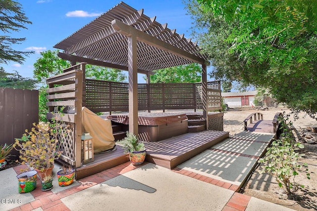 view of patio featuring a pergola and a hot tub