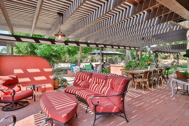 view of patio / terrace with an outdoor hangout area and a pergola