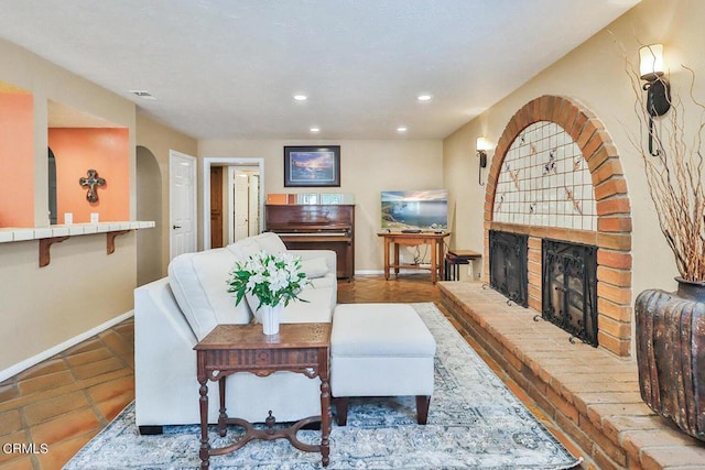 living room featuring a fireplace