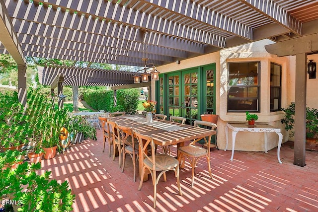 view of patio / terrace with a pergola and french doors