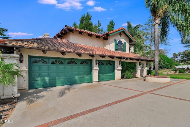 view of front of home with a garage