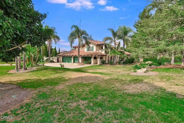 exterior space with a yard and a garage