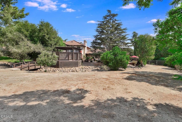 view of yard featuring a deck