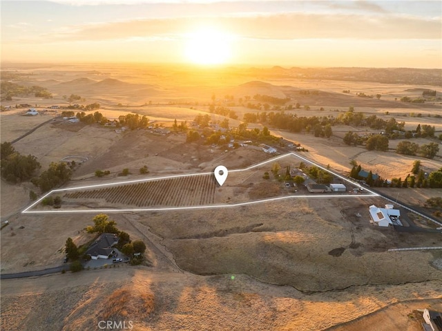 view of aerial view at dusk