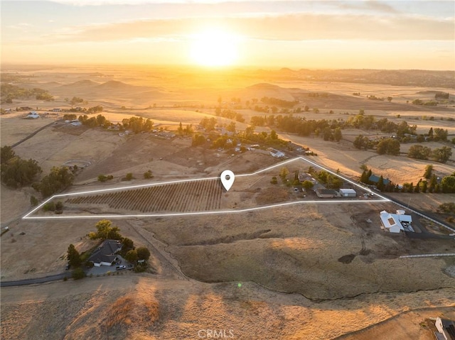 aerial view at dusk with a rural view