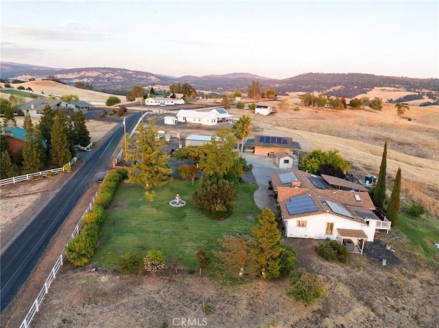 aerial view at dusk with a mountain view