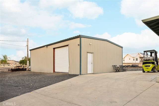 view of outbuilding with a garage