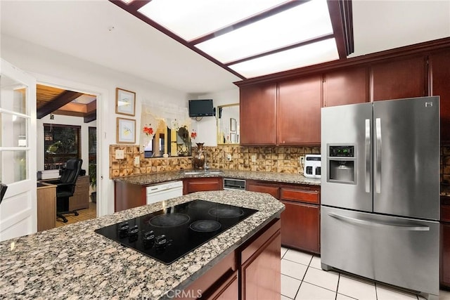 kitchen featuring beam ceiling, stainless steel refrigerator with ice dispenser, tasteful backsplash, white dishwasher, and black electric cooktop