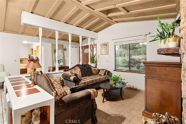 living room featuring light tile patterned floors and lofted ceiling with beams