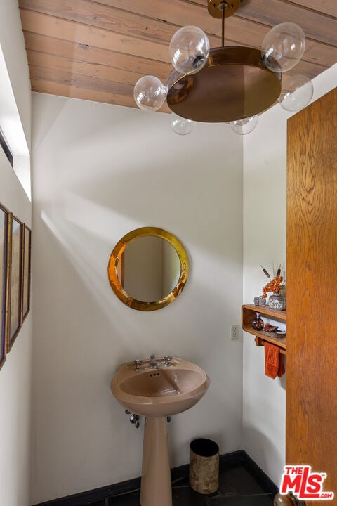 bathroom featuring wooden ceiling