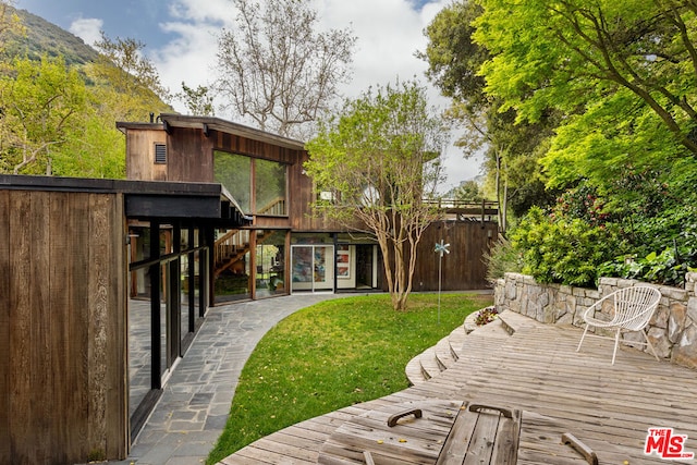 view of yard featuring a deck