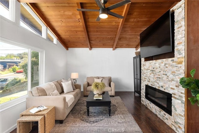 living room featuring wood ceiling, ceiling fan, dark hardwood / wood-style flooring, a fireplace, and vaulted ceiling with beams