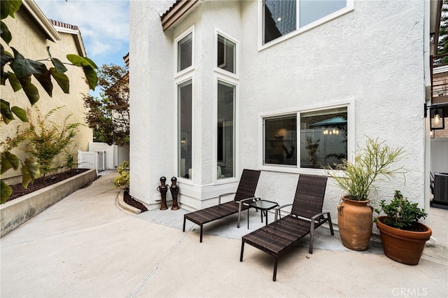 view of patio / terrace featuring fence