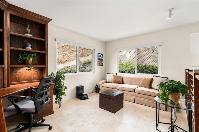 home office featuring baseboards