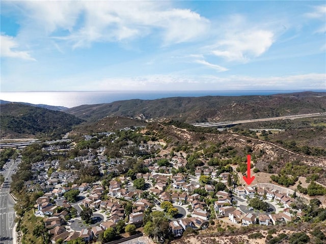 birds eye view of property with a residential view and a mountain view