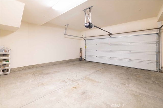 garage featuring a garage door opener