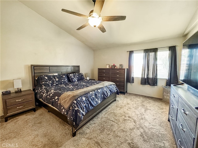 carpeted bedroom featuring ceiling fan and lofted ceiling