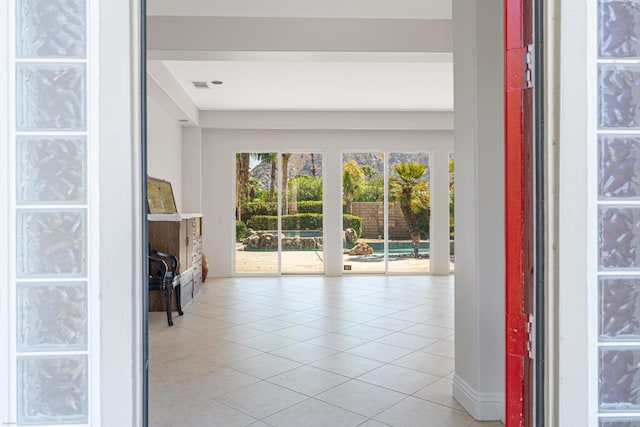 interior space featuring light tile patterned flooring