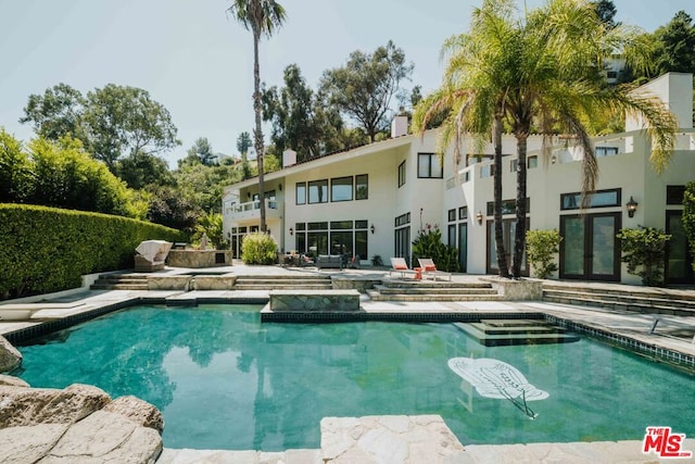 view of pool with a patio